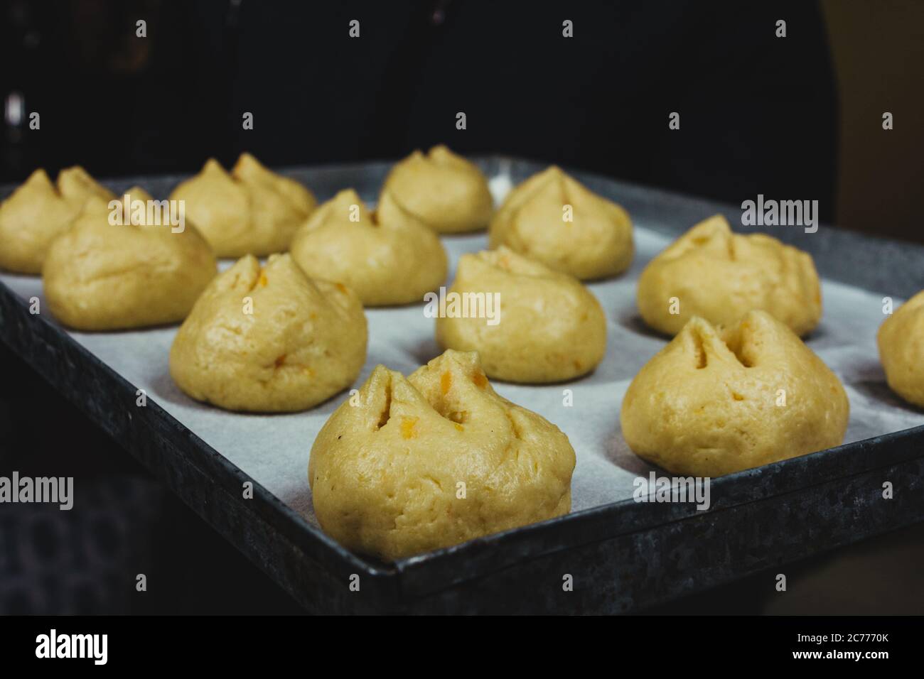 ready to bake bread dough, dough tray, flour Stock Photo Alamy