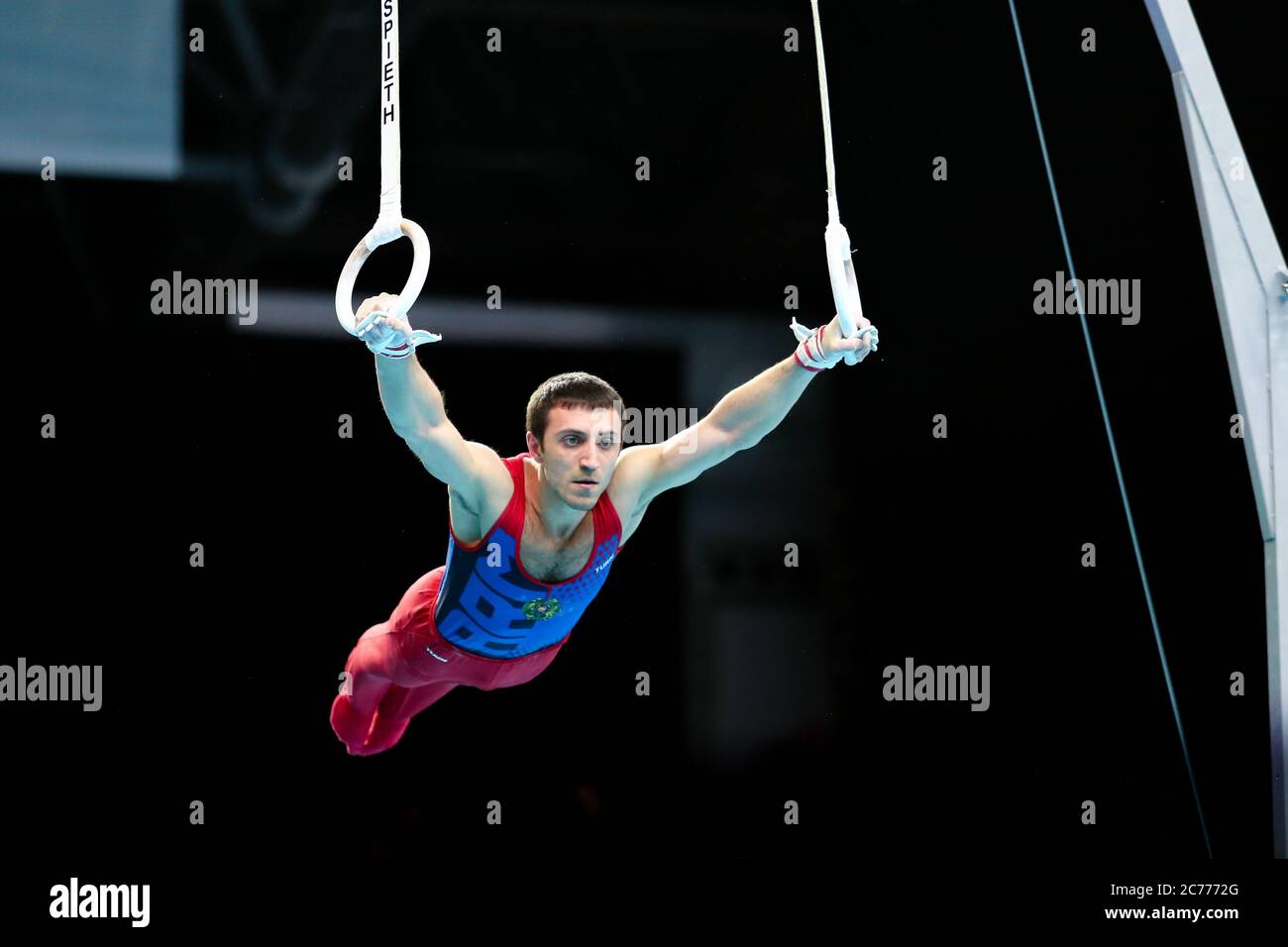 Szczecin, Poland, April 10, 2019:	Artur Davtyan of Armenia competes on the rings during the European artistic gymnastics championships Stock Photo