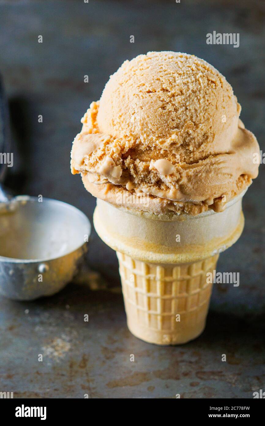 Salted caramel ice cream cone Stock Photo Alamy