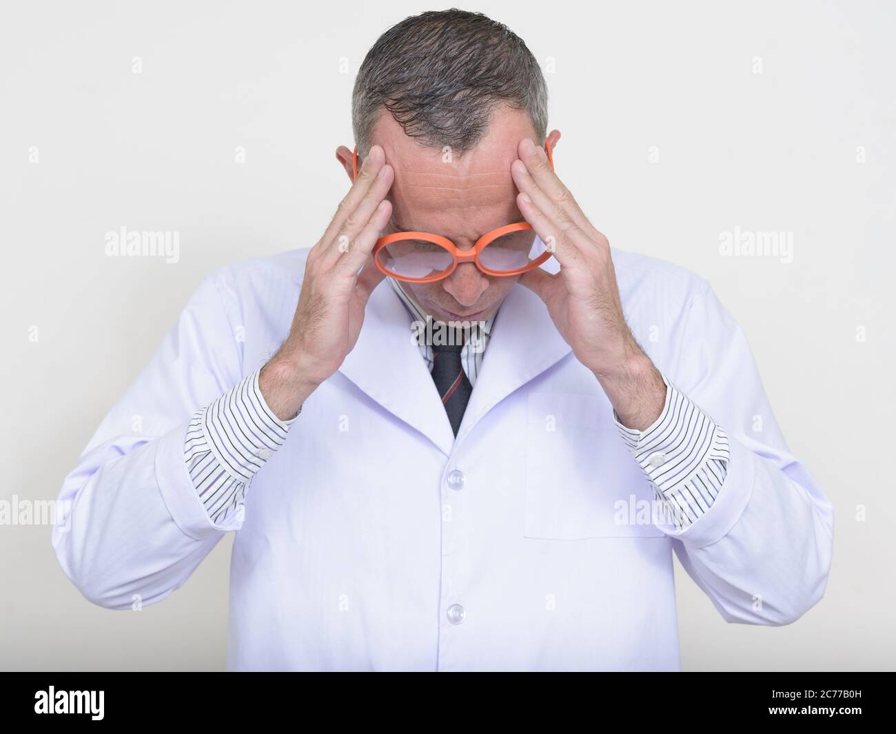 Portrait of mature man doctor wearing eyeglasses Stock Photo - Alamy