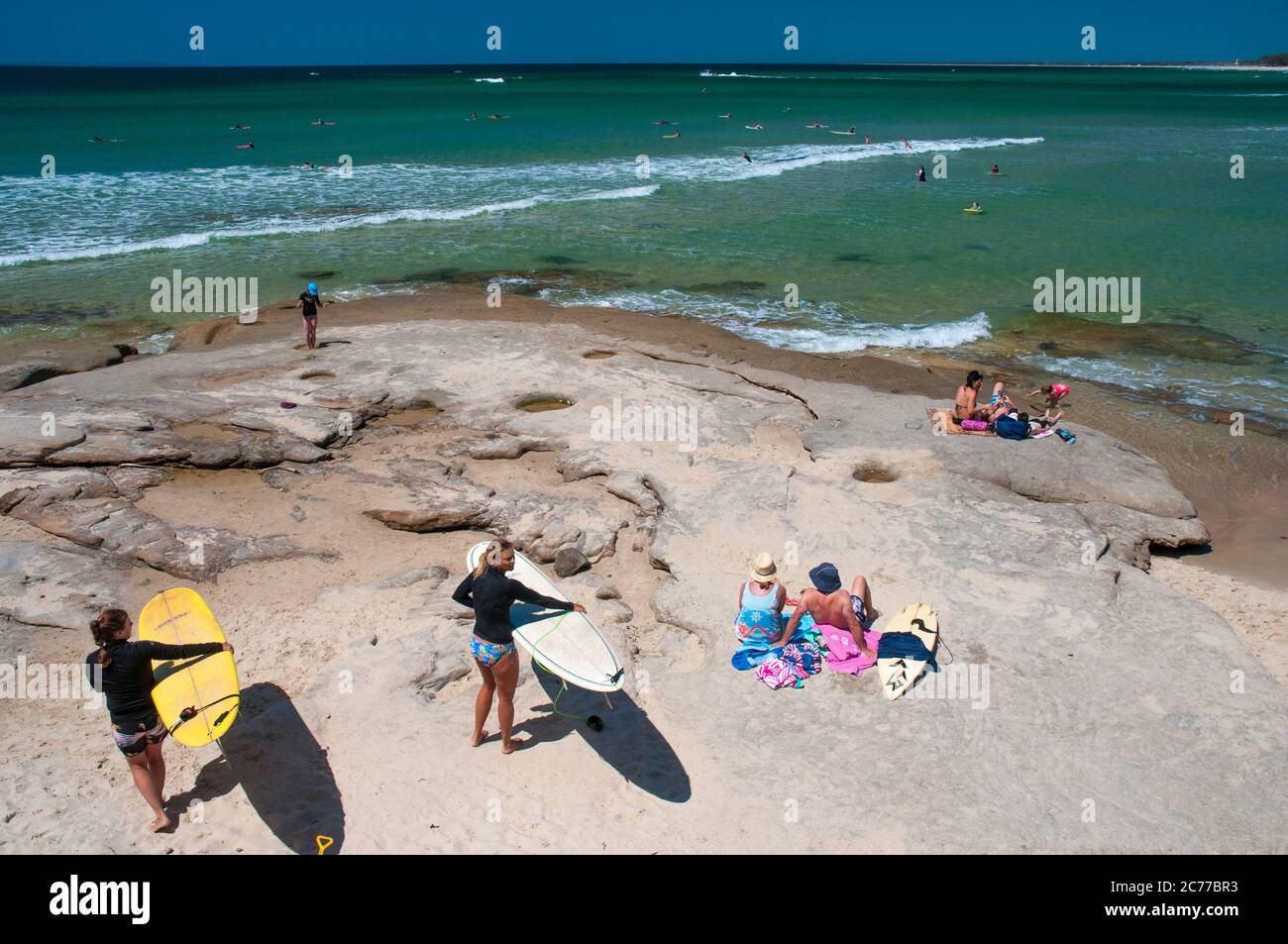 Female surfers at Bulcock Beach, Caloundra, Sunshine Coast, Queensland, Australia Stock Photo
