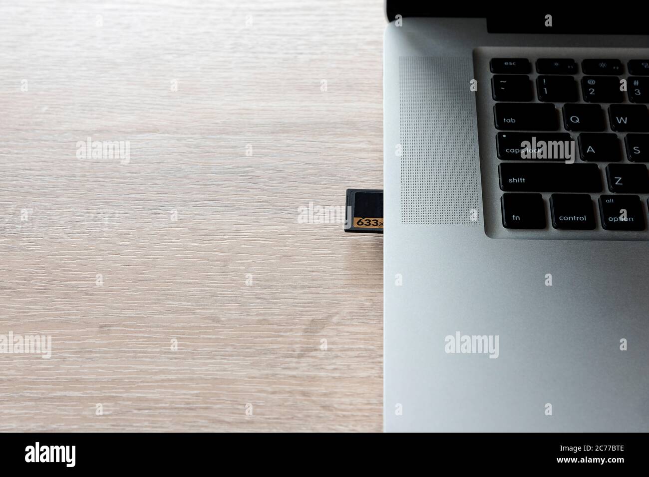 memory card of camera in laptop to transfer photos Stock Photo Alamy