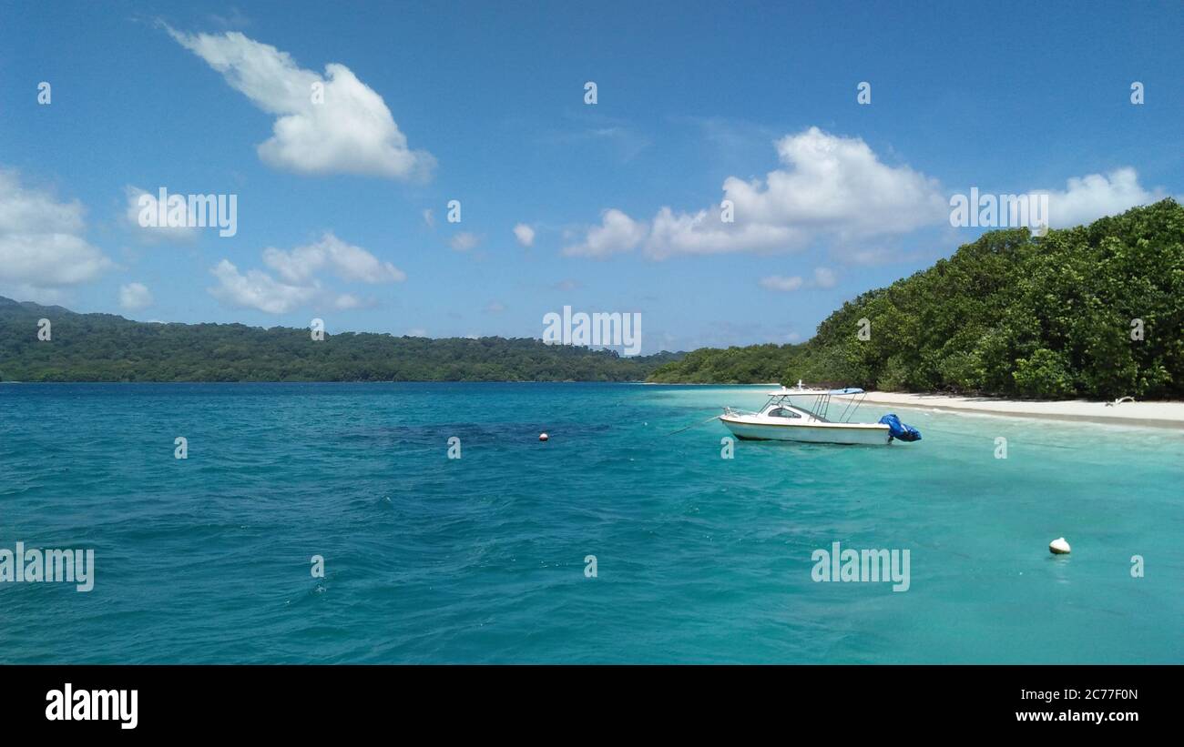 Scenic View Of Sea Against Sky. Ujung Kulon National Park. The coast of the Island of Peucang. Stock Photo