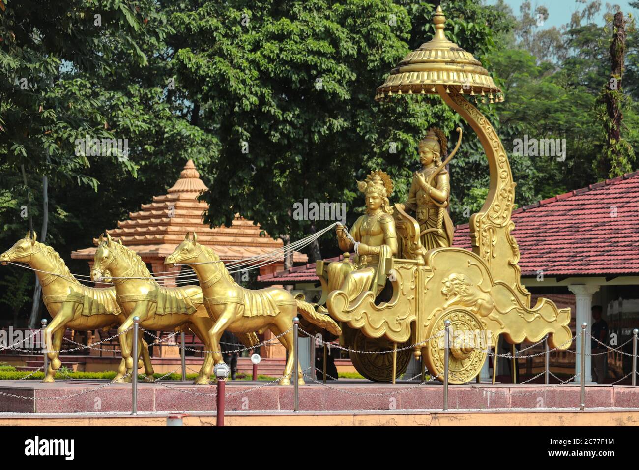 This is a historical Statue of lord Krishna and Arjun located at CG Shashwat Dham, Chitwan, Nepal. Stock Photo