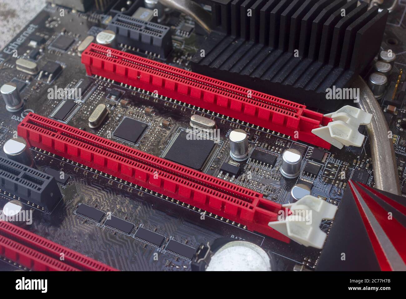 The Pci Express slot red color for video graphic card VGA card on computer motherboard Stock Photo