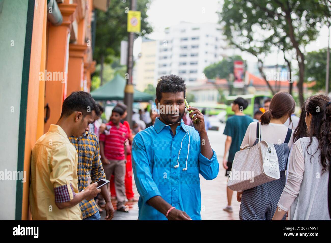 migrant workers in little india street singapore,singapore,little india singapore,colourful little india,indian migrants singapore,wall paintings Stock Photo