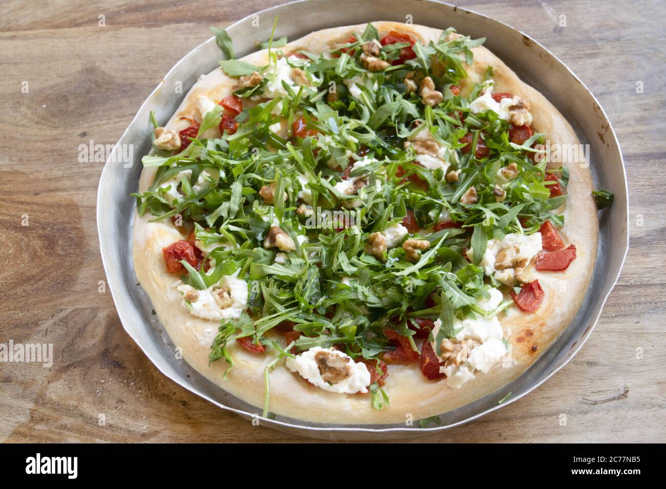 vegetarian pizza with wild rocket and buffalo mozzarella Stock Photo