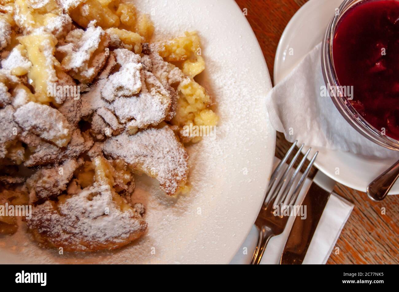 kaiserschmarrn with plum sauce and caster sugar Stock Photo