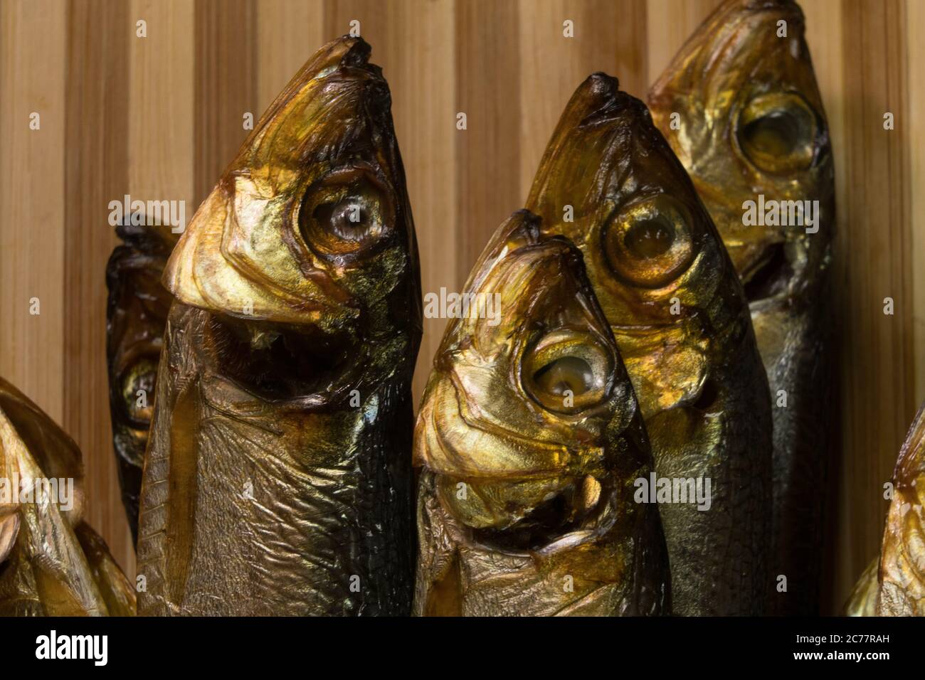 background of golden smokedried fish close up Stock Photo Alamy