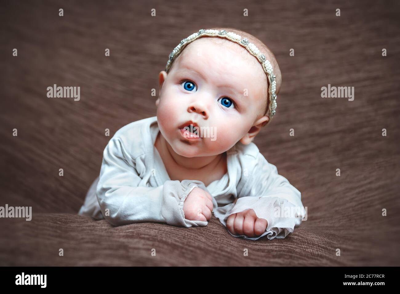 Baby girl closeup facial expression Stock Photo