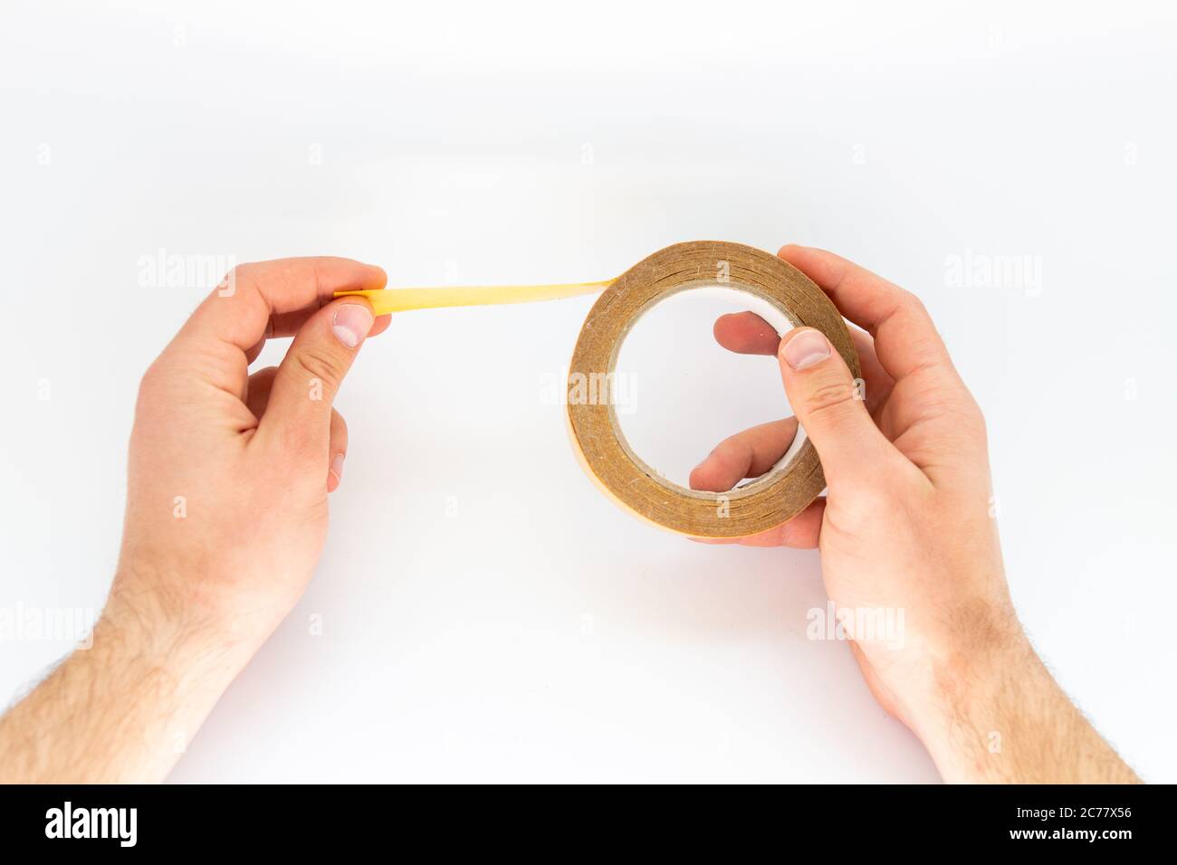 tape in hand on white background Stock Photo Alamy