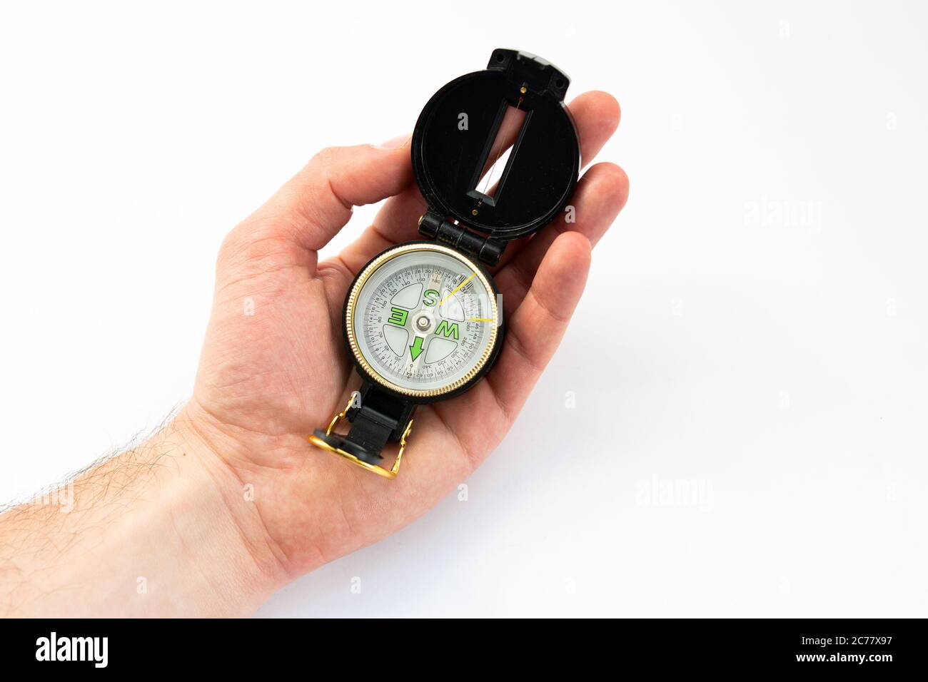 compass in hand on white background Stock Photo