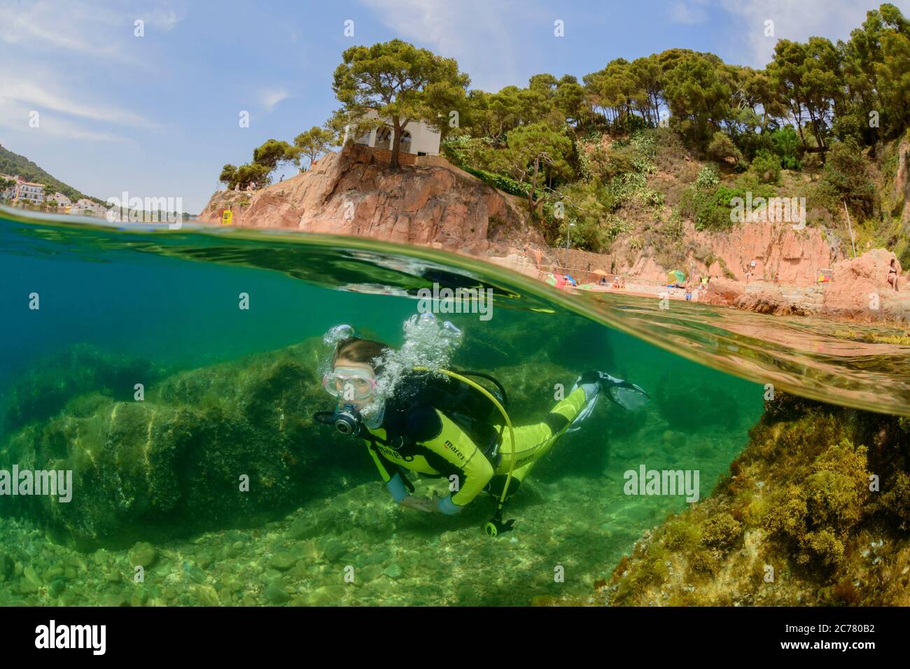 Split level picture from scuba diver on housereef in Tamariu, Costa Brava, Spain, Mediterranean Sea, MR Stock Photo