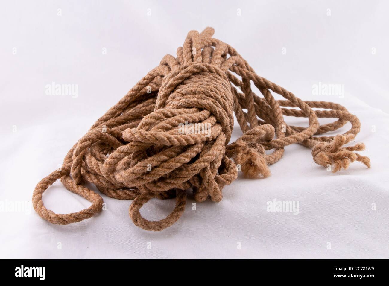 Coiling rope starting with ends and bight locked with tuck under wraps