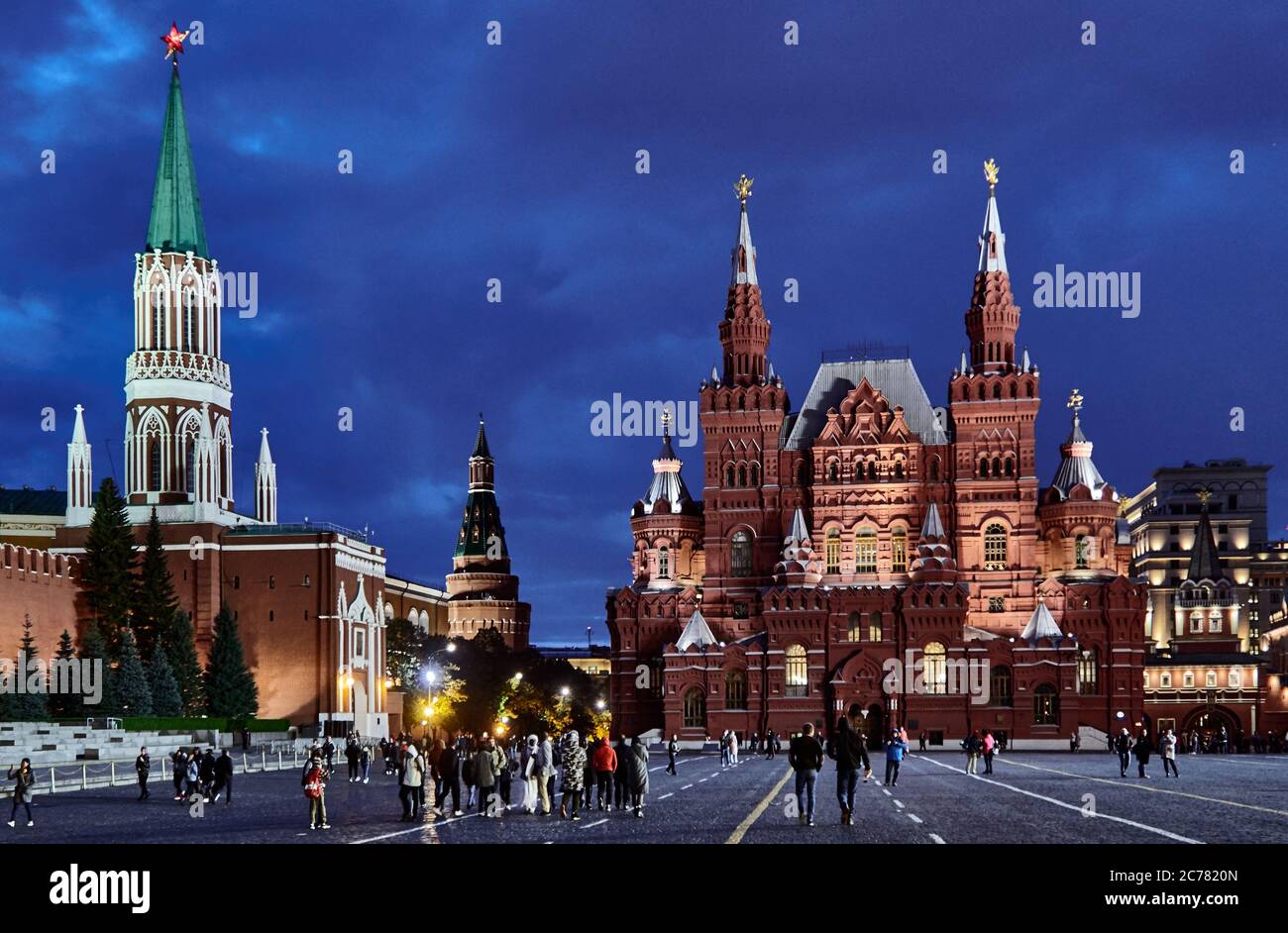 Moscow, Russia. The State Historical Museum and Grand Kremlin Palace situeted on the Red Square is Russian history. At dusk lot of peoples like to walk on the Red Square. Stock Photo