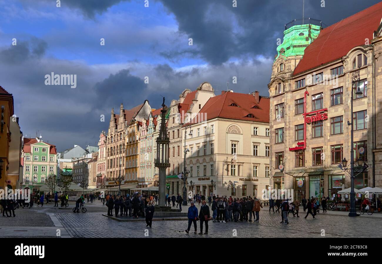 Poland, Wroclaw city,province of Lower Silesia,Rynek is surrounded by the tenement houses funded by the patricians of Wroc&#x142,aw. The original building, stylistically different from the rest, is a modernist high rise built to the design of Heinrich Rump in 1930. Stock Photo