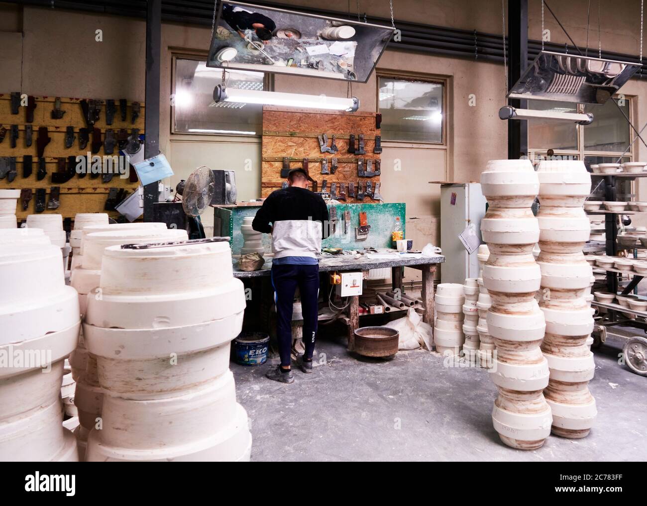 Boleslawiec, Lower Silesia, Poland., Worker  in a ceramics factory Stock Photo