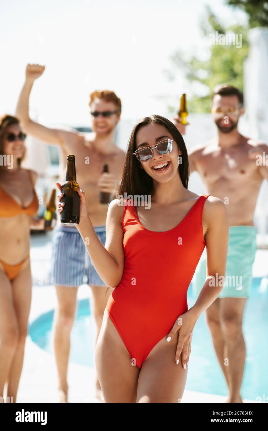 Smiling Woman with Loose Hair Swimming Backstroke in a Bi-color Bikini  Swimsuit Stock Photo - Image of room, resort: 136455762