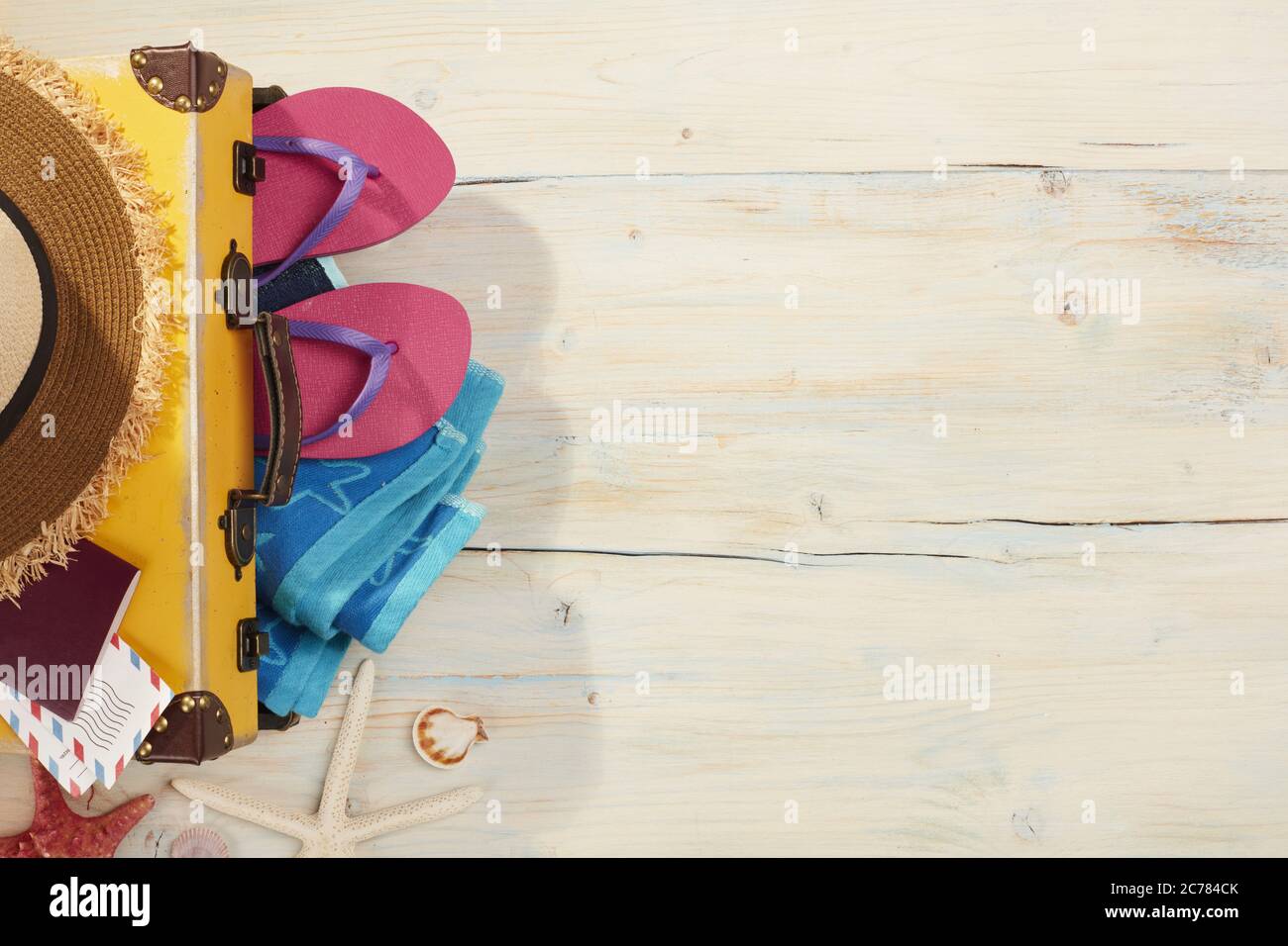 Beach items on a wooden background Stock Photo