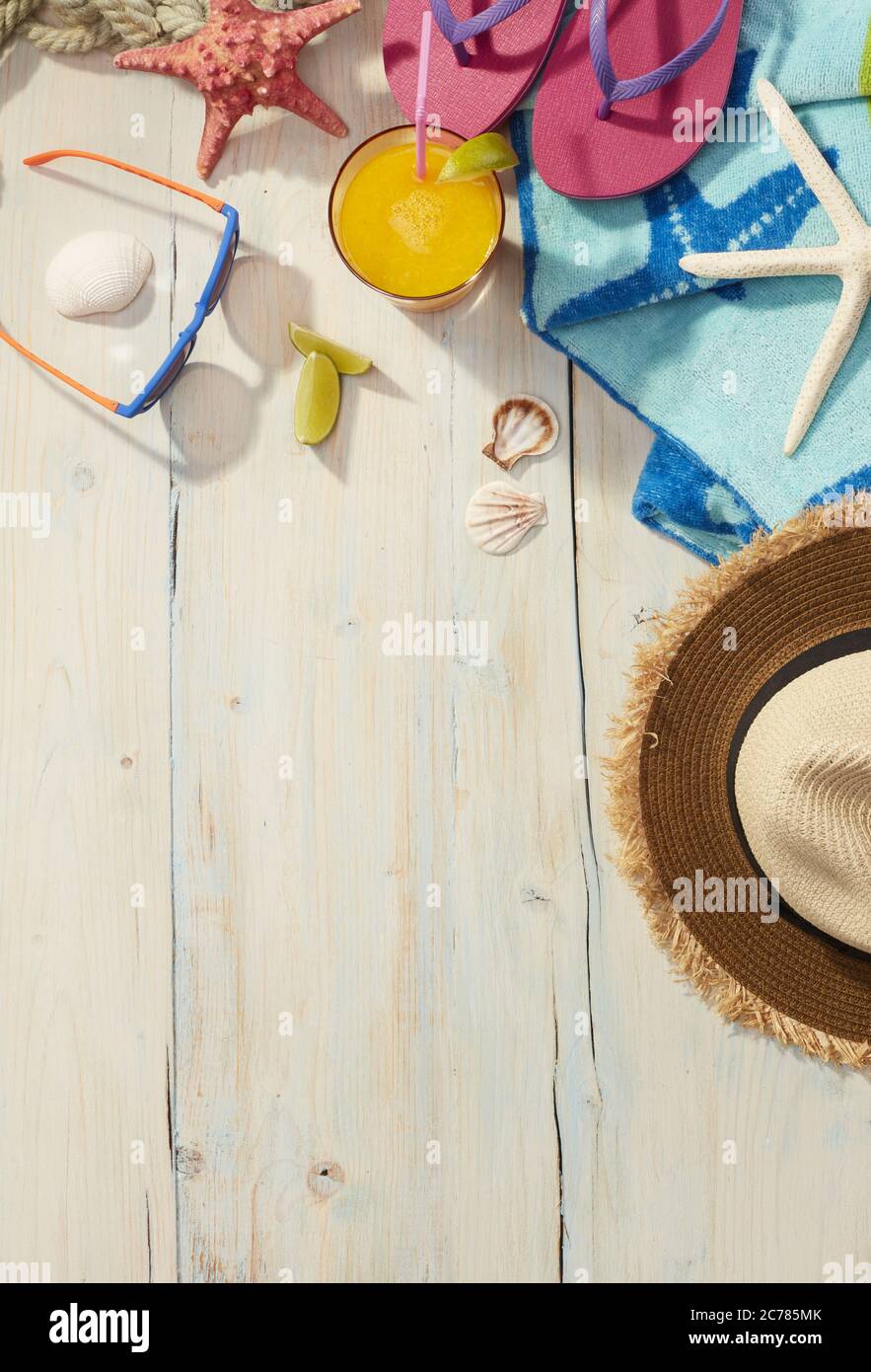 Beach items on a wooden background Stock Photo