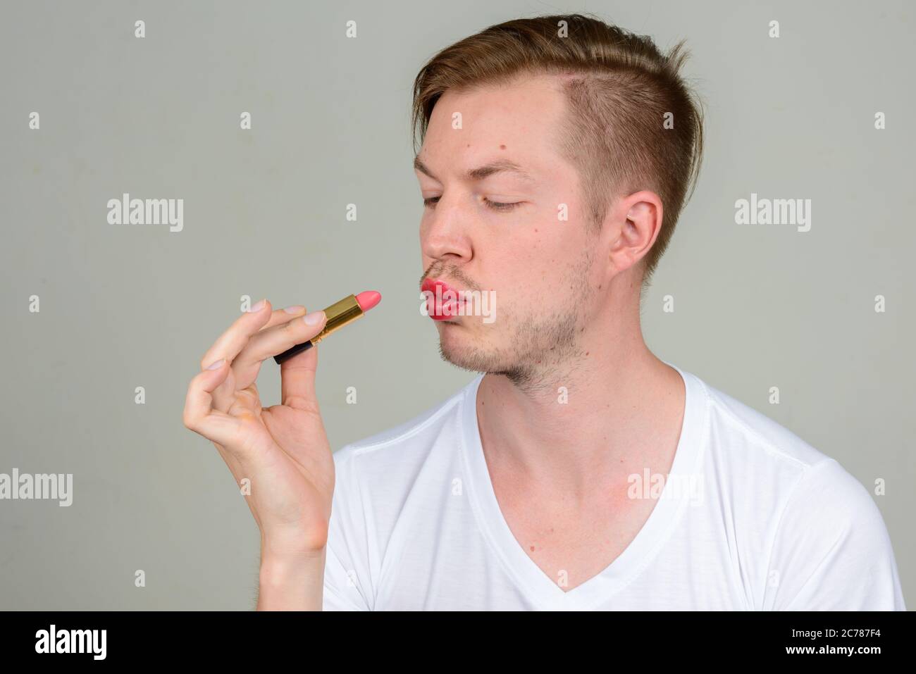 Man stubble lipstick hi-res stock photography and images - Alamy