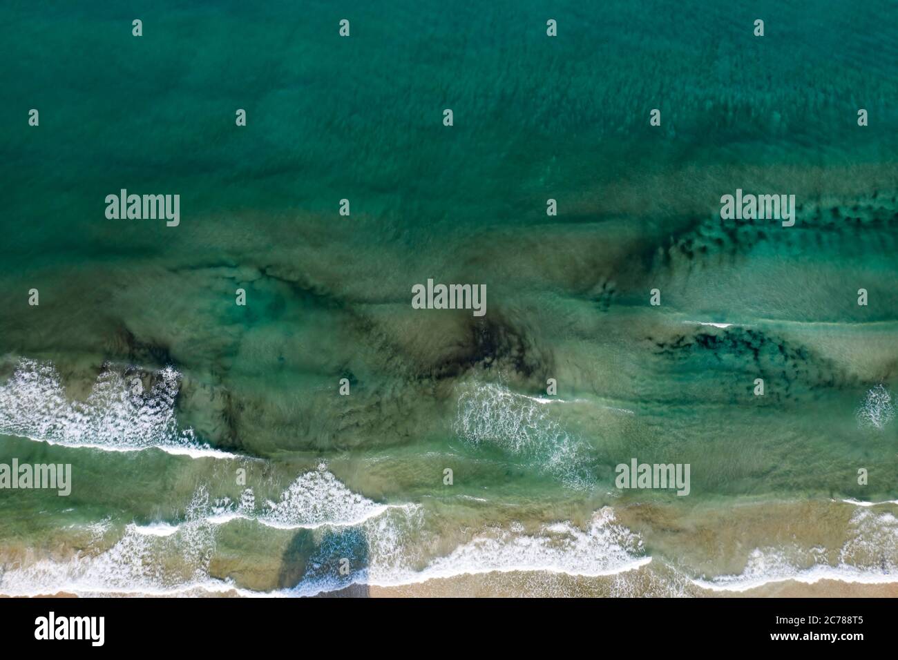 Aerial view of tropical sandy beach and blue ocean with crystal clear ...