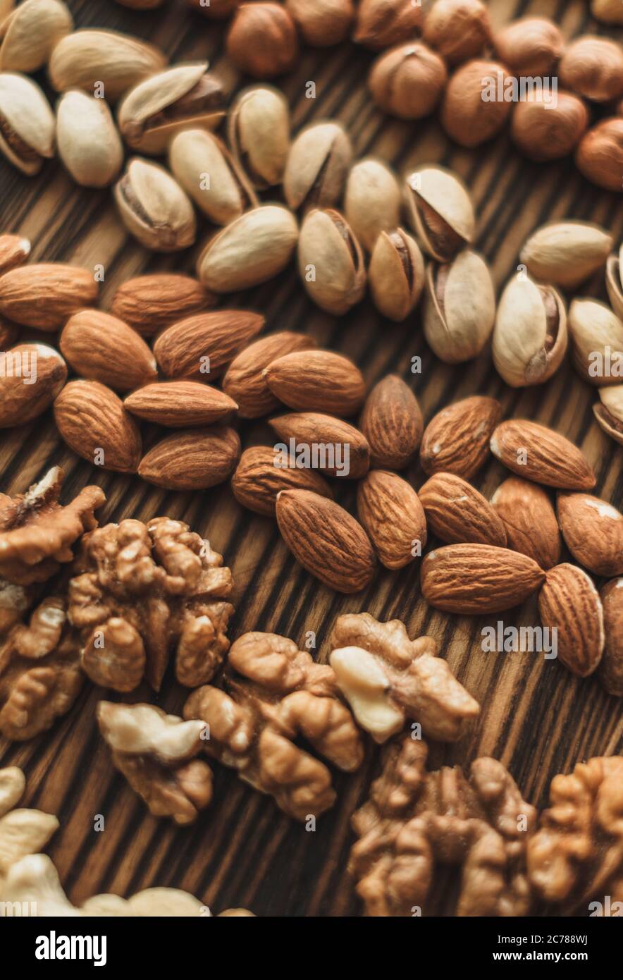 Different types of nuts, nut mix of almonds, hazelnuts, cashews