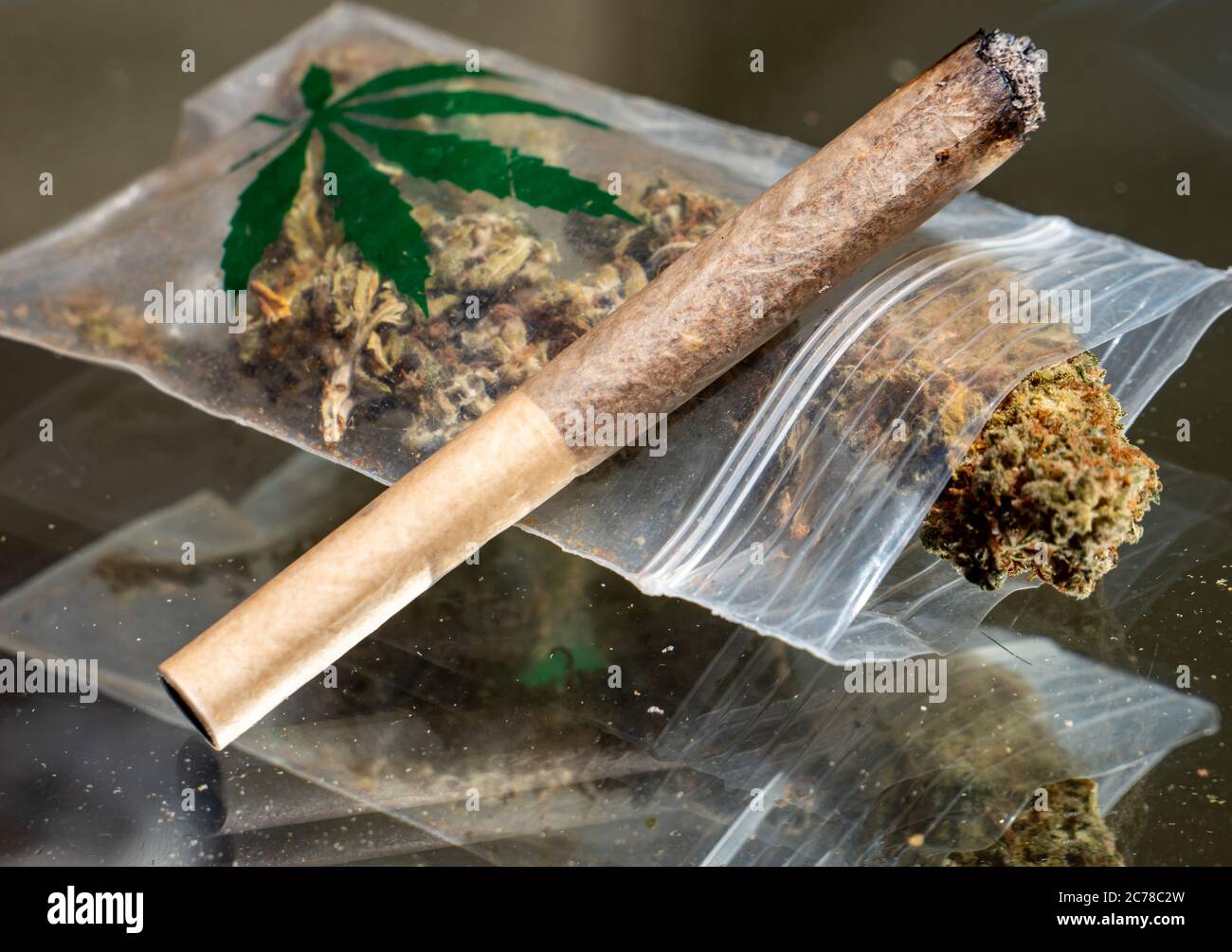 burning joint with marijuana cannabis drugs Stock Photo Alamy