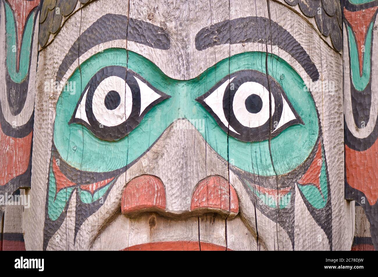 Eyes Closeup of a Carved Painted Alaskan Native Tribal Totem Pole Stock Photo
