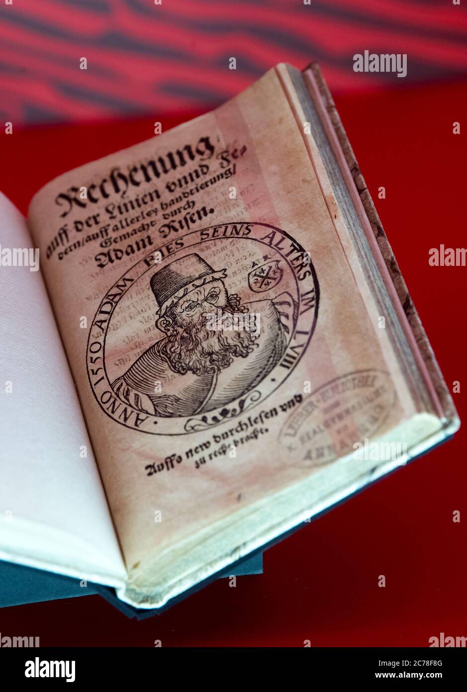 10 July 2020, Saxony, Zwickau: The second calculation book by Adam Ries, Rechnung auf der Linien und Federn', is shown in the central exhibition of the 4th Saxonian State Exhibition. The show under the motto 'Boom. 500 Years of Industrial Culture in Saxony' spans the arc from the Great Mountain Shrine in the 15th century to the far future of the Free State. From 11 July to 31 December 2020, the show brings together more than 600 exhibits from around 130 lenders. In addition to the central exhibition in the Audi-Bau, a former assembly hall of the Auto-Union, industrial culture can be experience Stock Photo