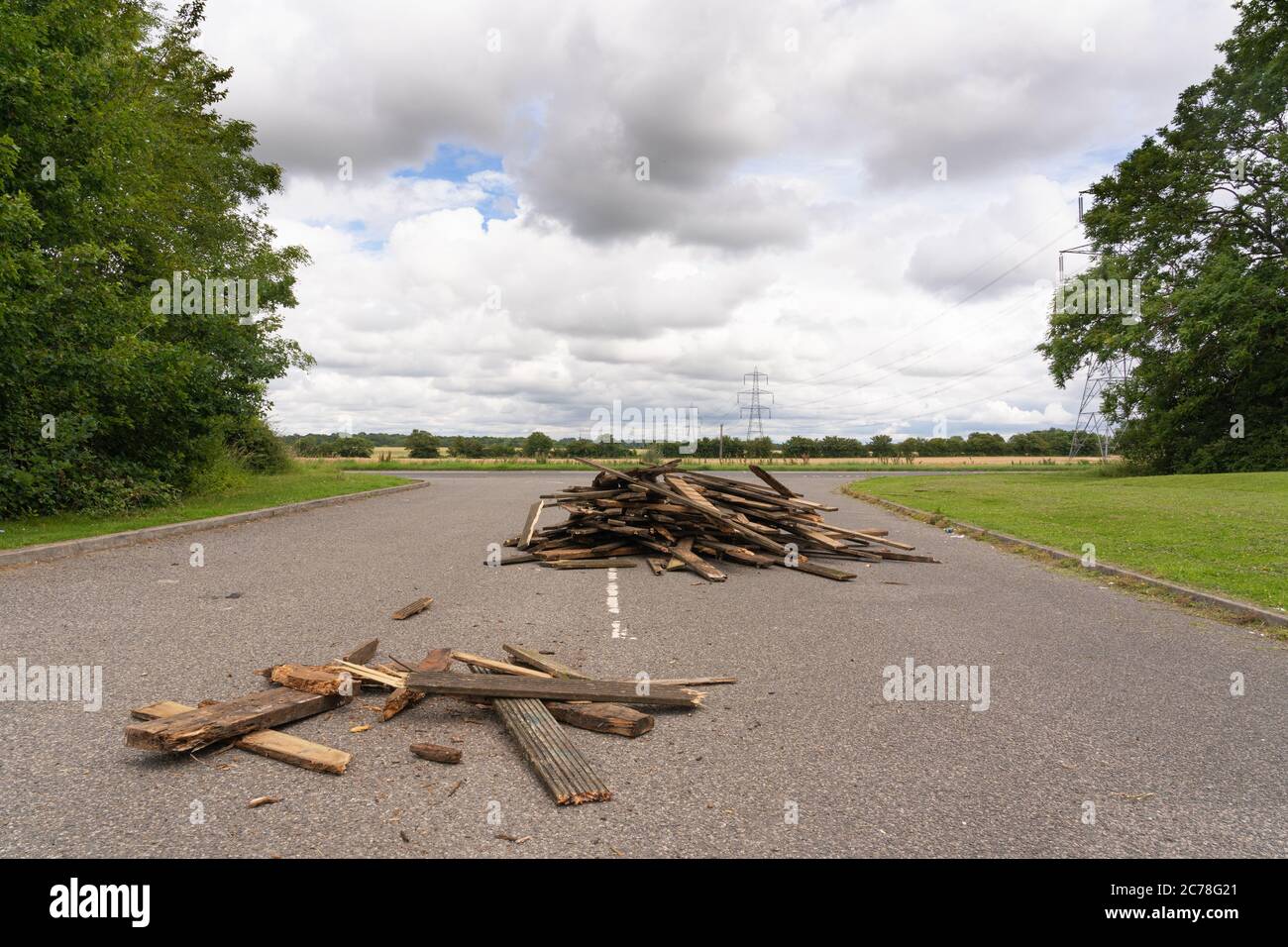 Illegal fly tipping of waste in a lane near Bishop's Stortford, Hertfordshire. UK Stock Photo