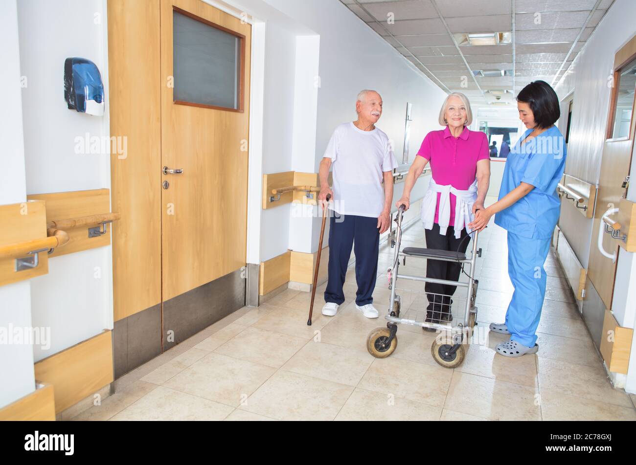 Elderly woman with walker hi-res stock photography and images - Alamy