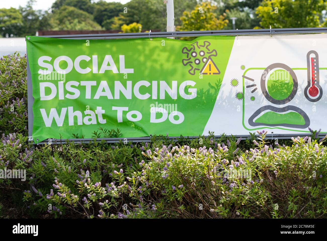 Social Distancing sign outside Asda supermarket, during coronavirus pandemic, Bearsden, Glasgow, Scotland, UK Stock Photo