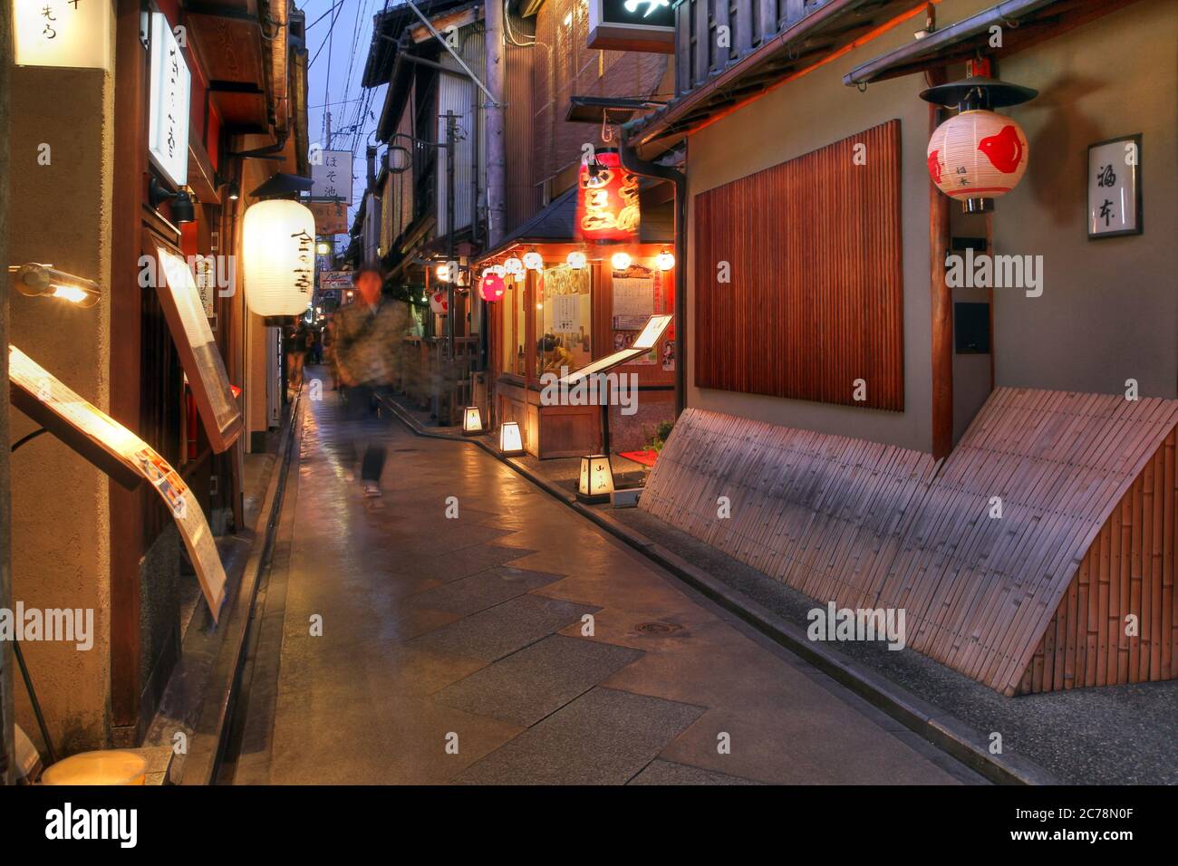 Kyoto, Japan - December 25, 2011: Narrow pedestrian street known as Pontocho alley in the old part of Kyoto, Japan at night. Pontocho alley used to be Stock Photo