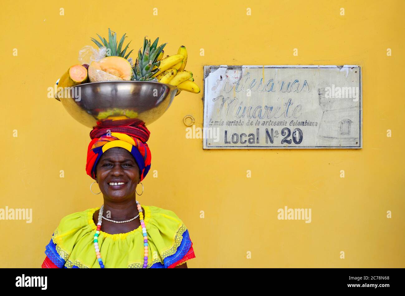 Colourful Colombian Palenquera - Cartagena de Indias, Colombia Stock Photo