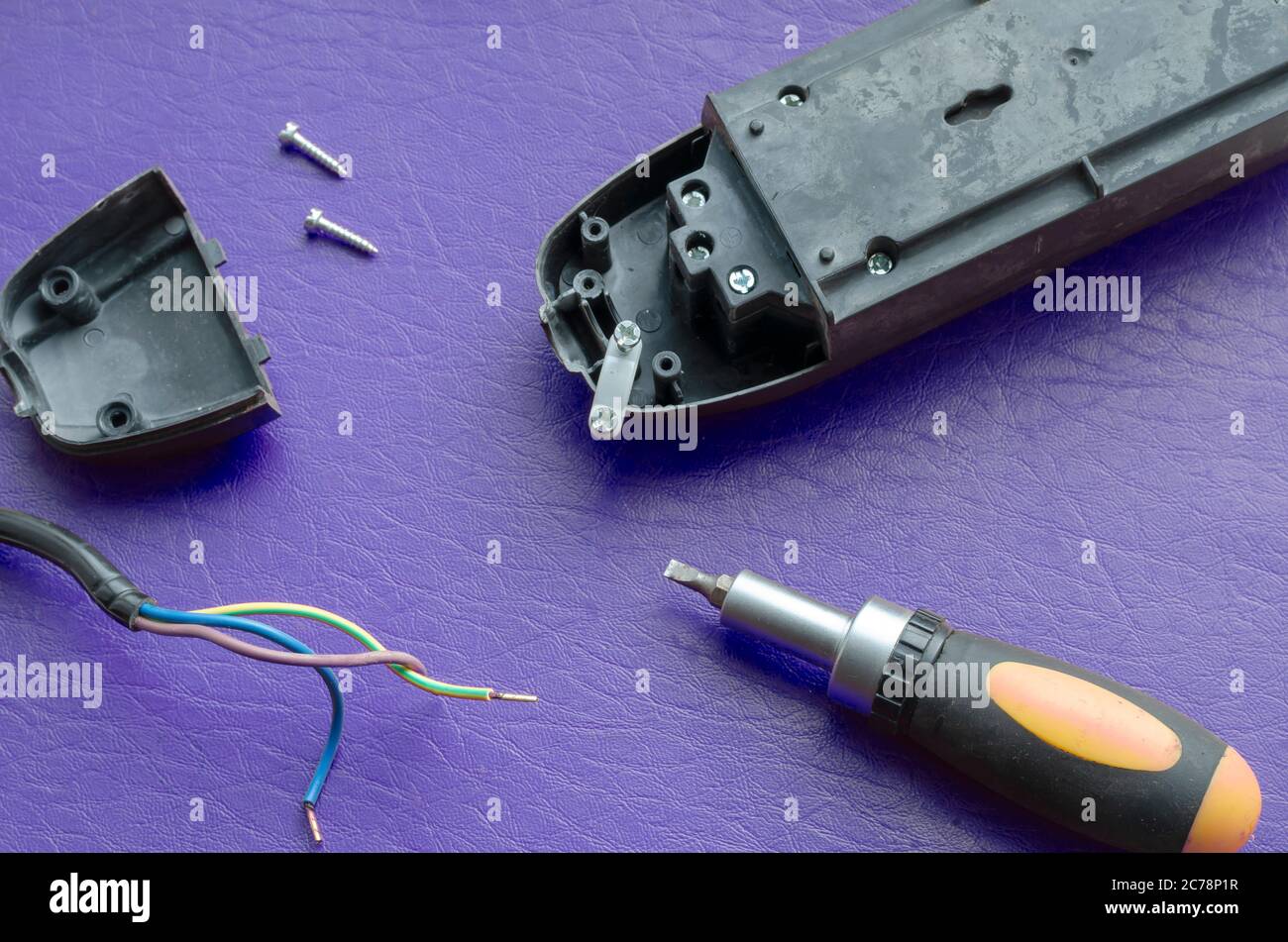 Electric splitter, cable and screwdriver. Connecting wiring to the ...