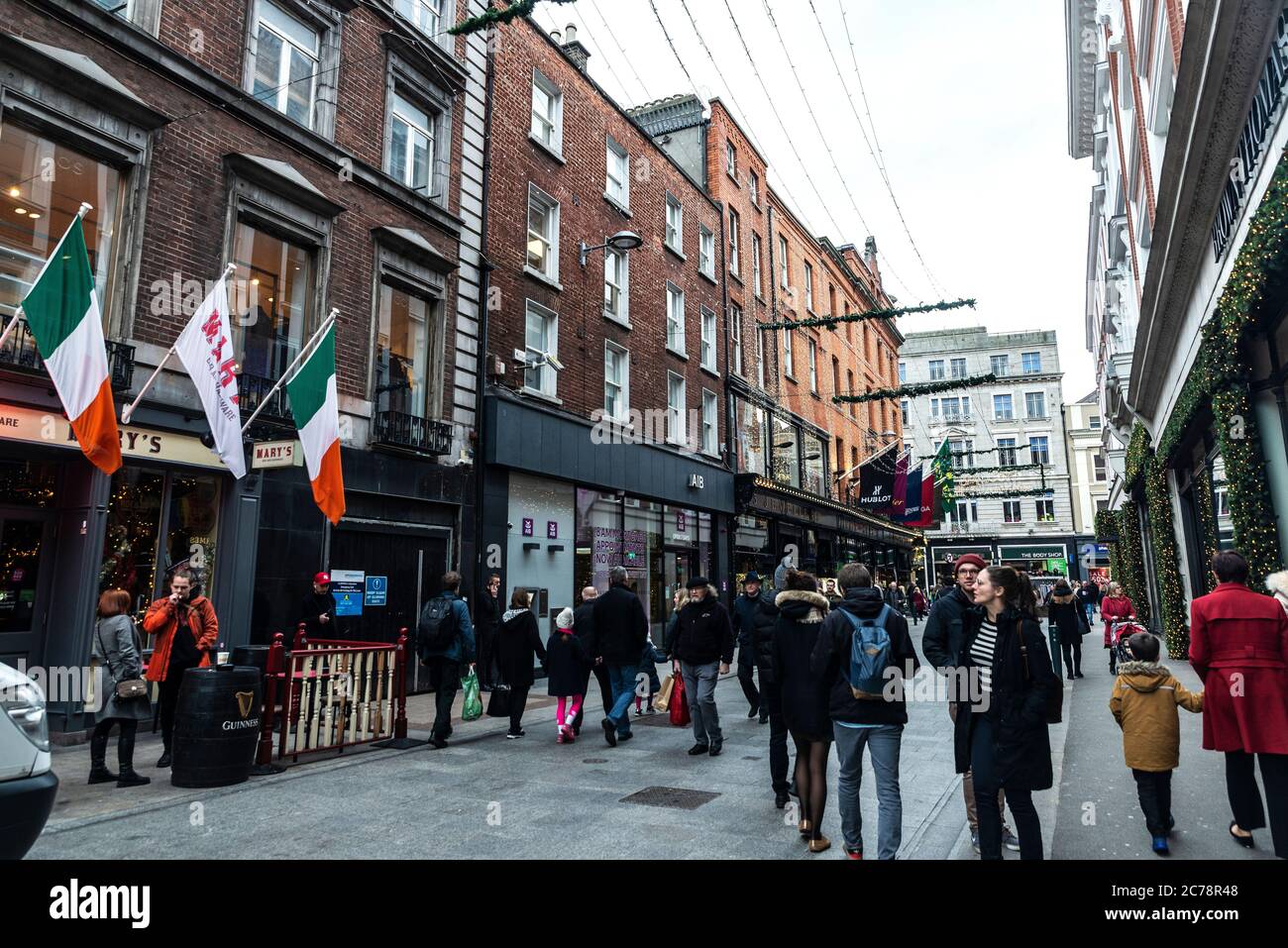Dublin, Ireland December 30, 2019 Grafton Street with restaurants, luxury shops and people