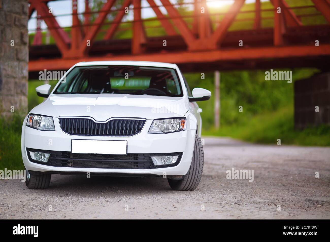 Front-side view of a car on nature background Stock Photo - Alamy
