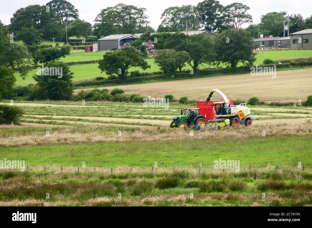 Around the UK - A farmer collecting sileage from fields near Brindle in Lancashire, UK Stock Photo