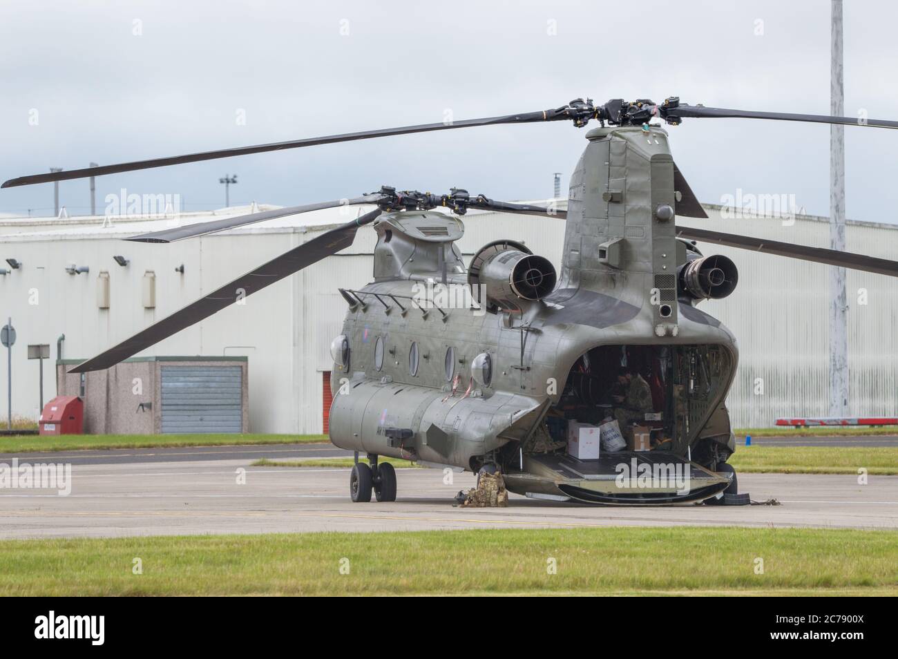 Glasgow, Scotland, UK.15 July 2020. Pictured: Royal Air Force Chinook Helicopters seen on the tarmac at Glasgow International Airport. One of the helicopters have gone ‘tech’ and a spare part has been flown in. Credit: Colin Fisher/Alamy Live News Stock Photo