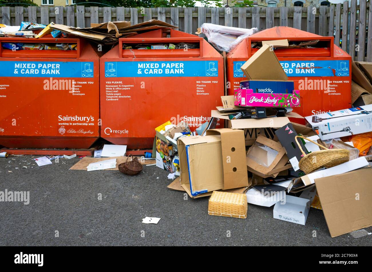 Three identical recycling bins for waste paper and cardboard Sainsbury