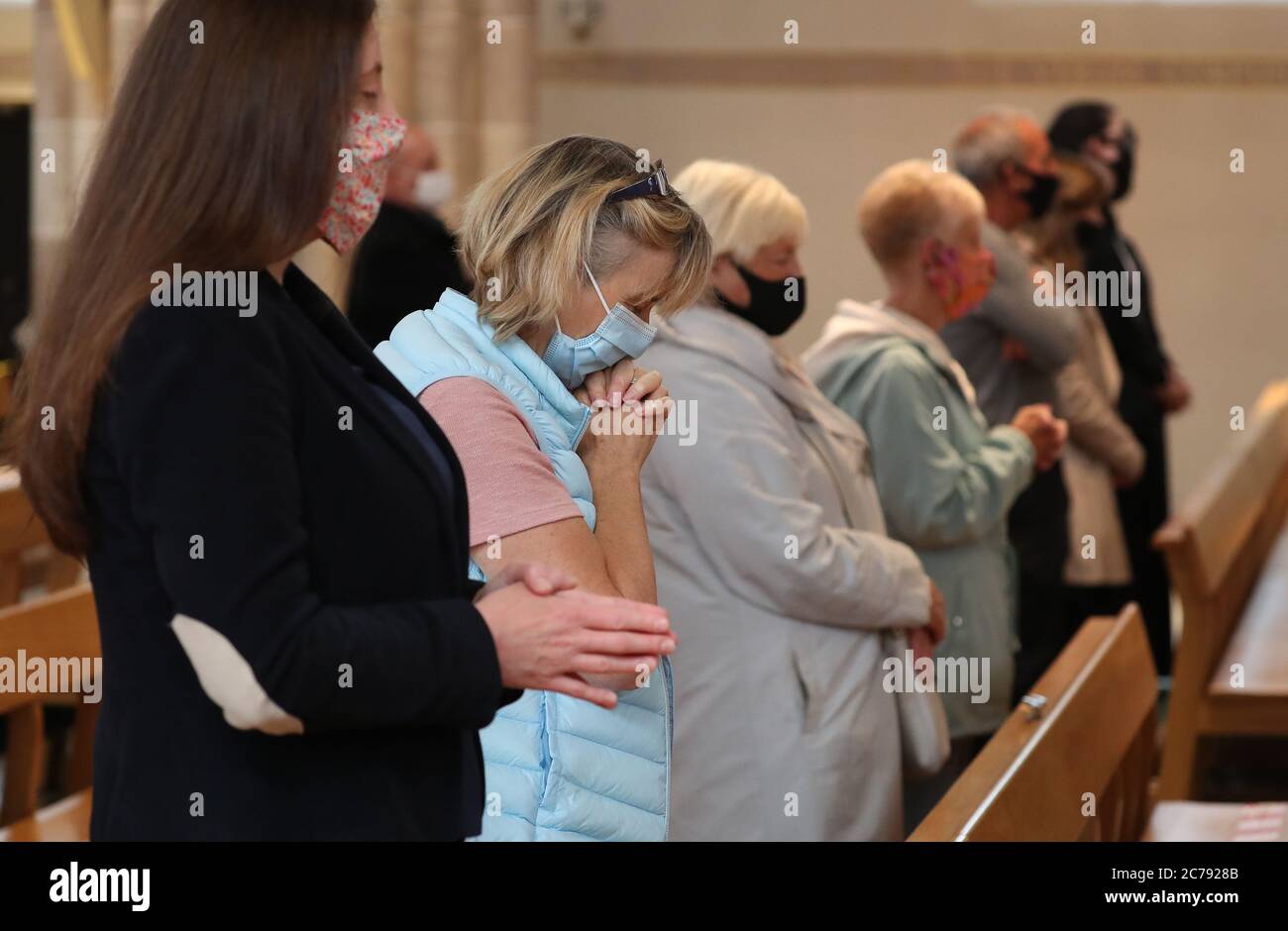 Members of the congregation during the first mass at St Andrew's Cathedral in Glasgow since the 19th March was held as Scotland prepares for the lifting of further coronavirus lockdown restrictions. Stock Photo