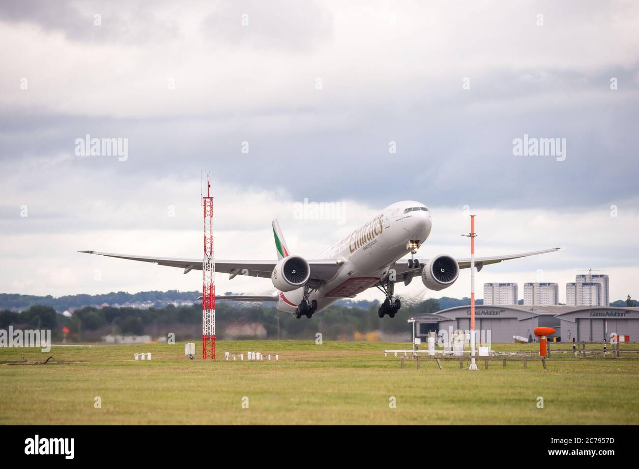 Glasgow, Scotland, UK. 15th July, 2020. Pictured: Emirates flight EK28, Boeing 777-31H(ER) aircraft (reg A6-EGE) departs Glasgow International Airport for Dubai. First flight back after the lockdown was eased. Following the coronavirus (COVID19) crisis, the global aviation industry has been massively affected, causing some airlines to go bust and the others to cut huge numbers of staff and cancel orders on new aircraft. Emirates cancelled their flights to Glasgow until today. Credit: Colin Fisher/Alamy Live News Stock Photo