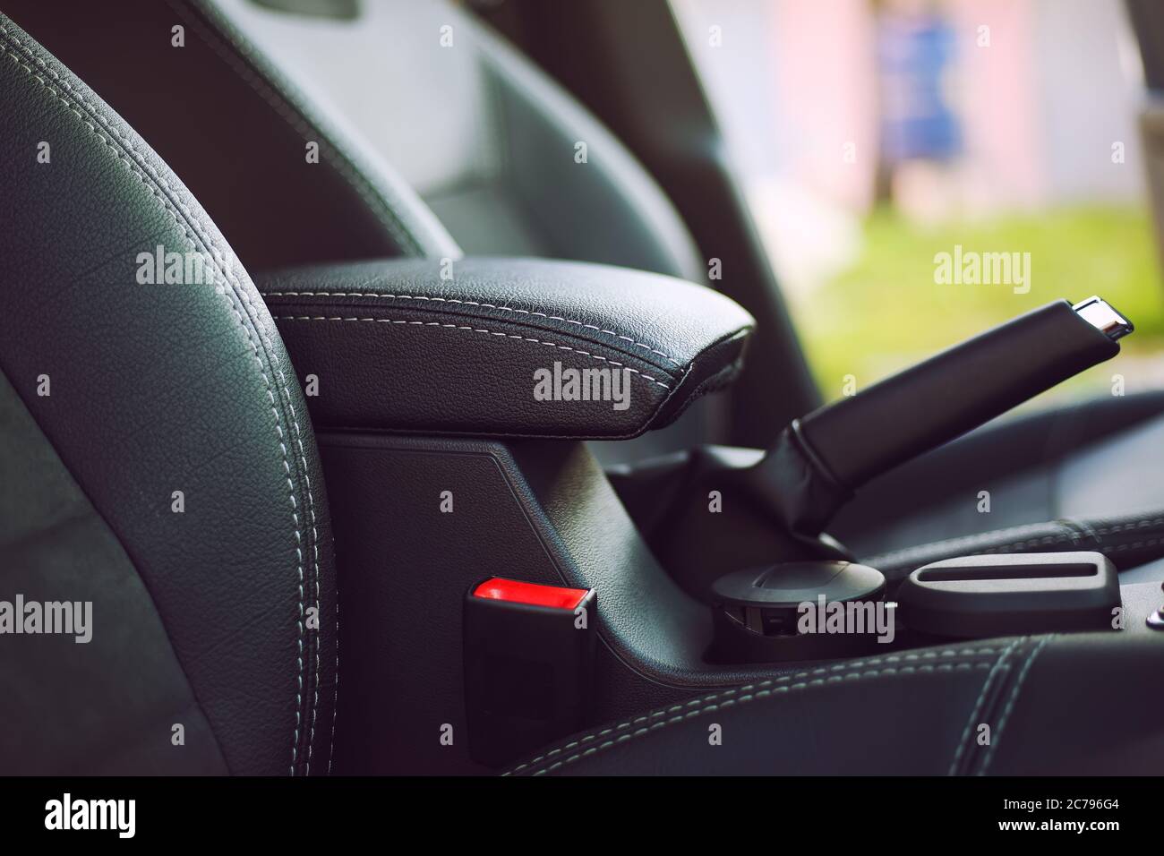 armrest in the luxury passenger car, detail in the interior Stock Photo