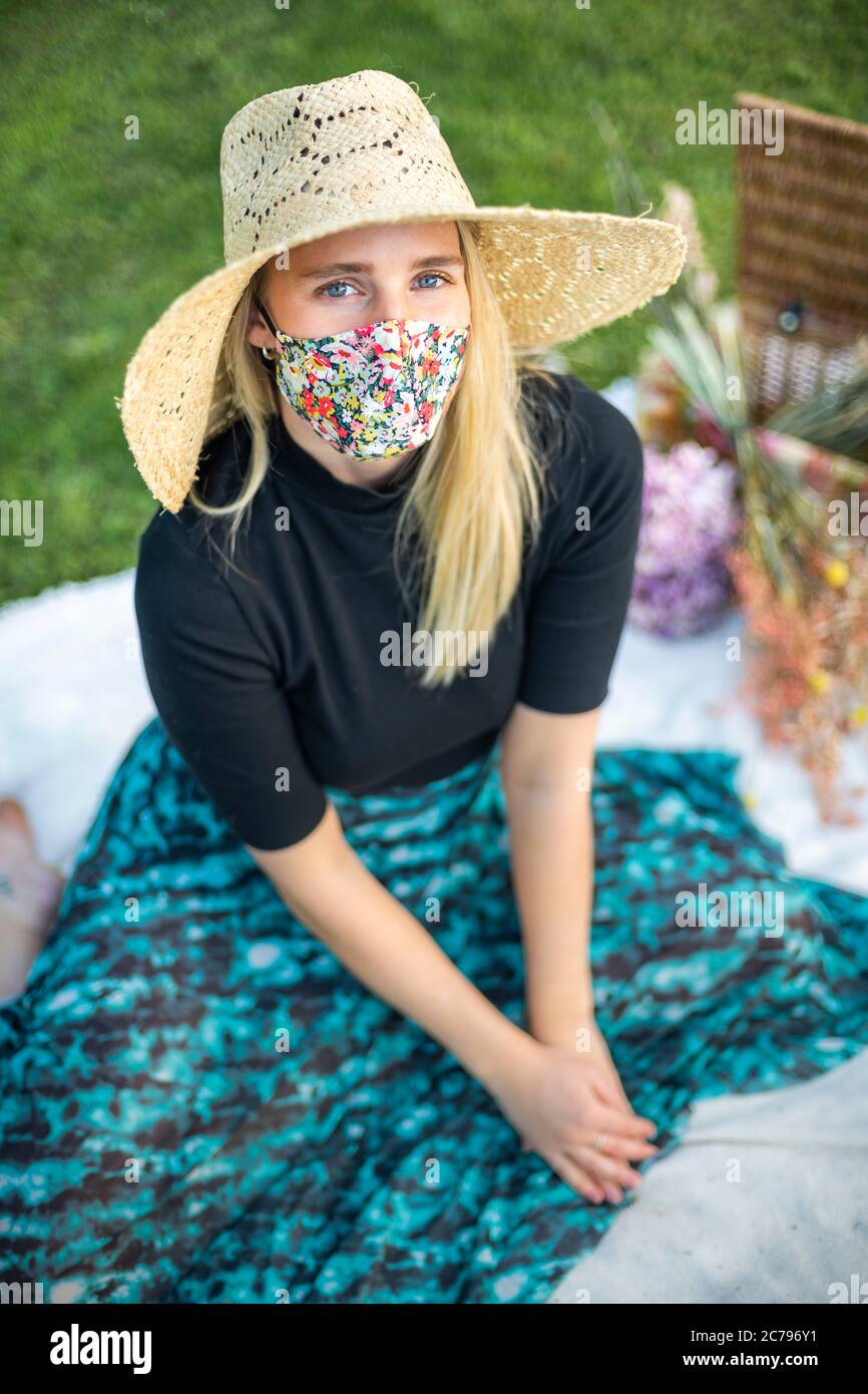 Blonde woman wearing floral hi-res stock photography and images - Alamy