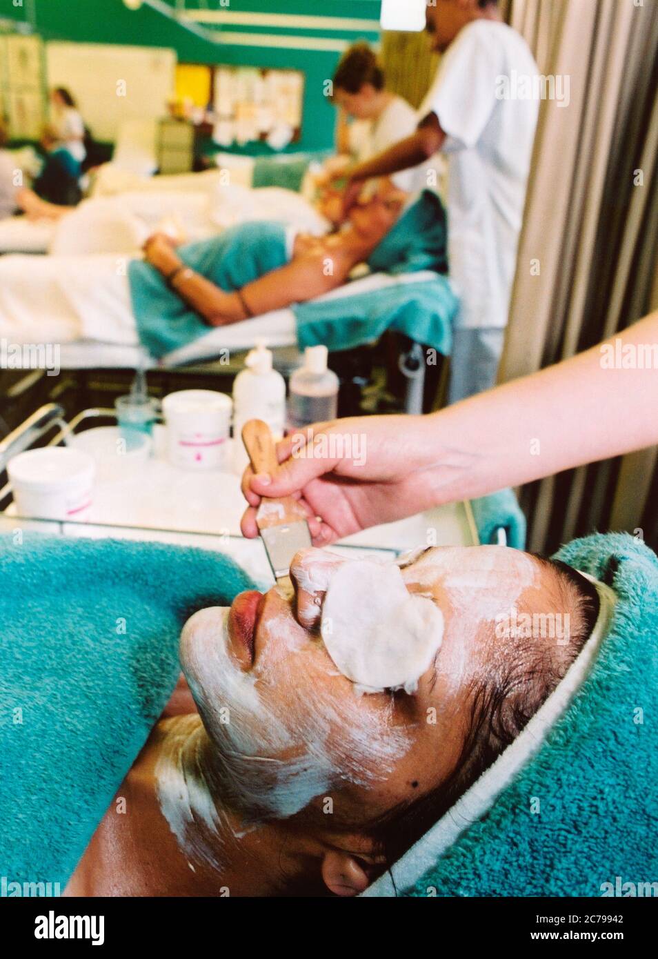 NVQ Beauty Therapy course at Huddersfield Technical College; applying face mask UK Stock Photo