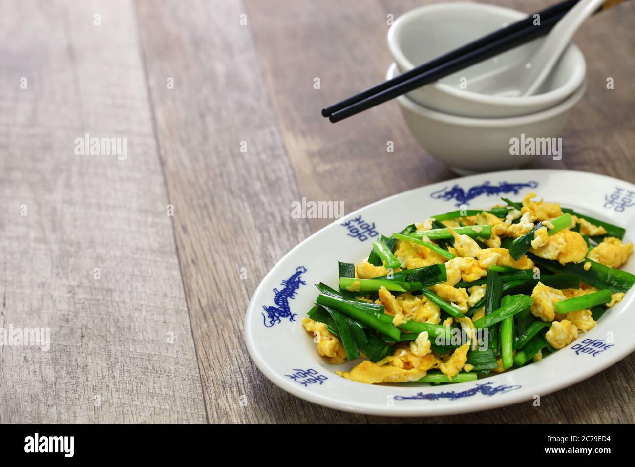 chinese chives and eggs stir fry Stock Photo Alamy