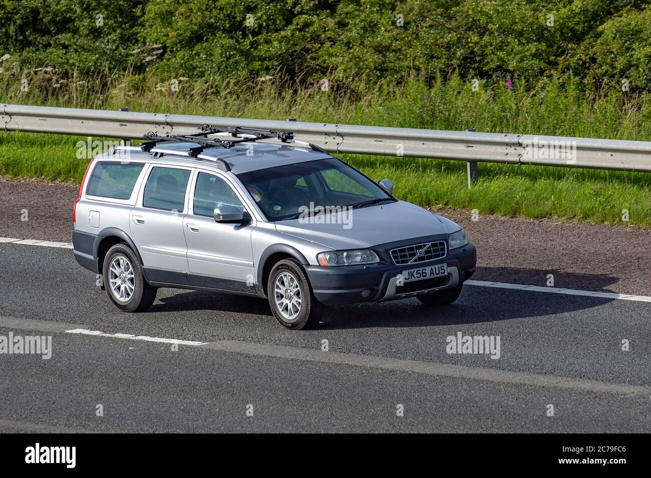 2006 silver Volvo XC70 Cross Country Vehicular traffic moving vehicles,  cars driving vehicle on UK roads, motors, motoring on the M6 motorway  highway network Stock Photo - Alamy
