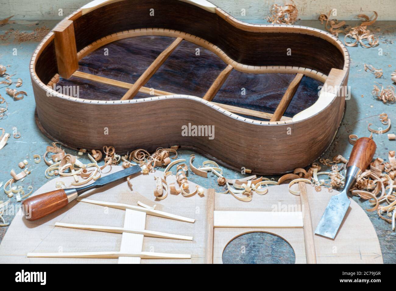 Luthier workbench with tools and an acoustic guitar under construction  Stock Photo - Alamy