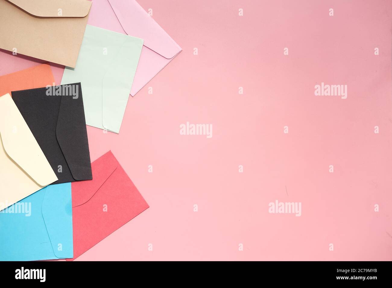 colorful envelope on pink background with copy space Stock Photo - Alamy